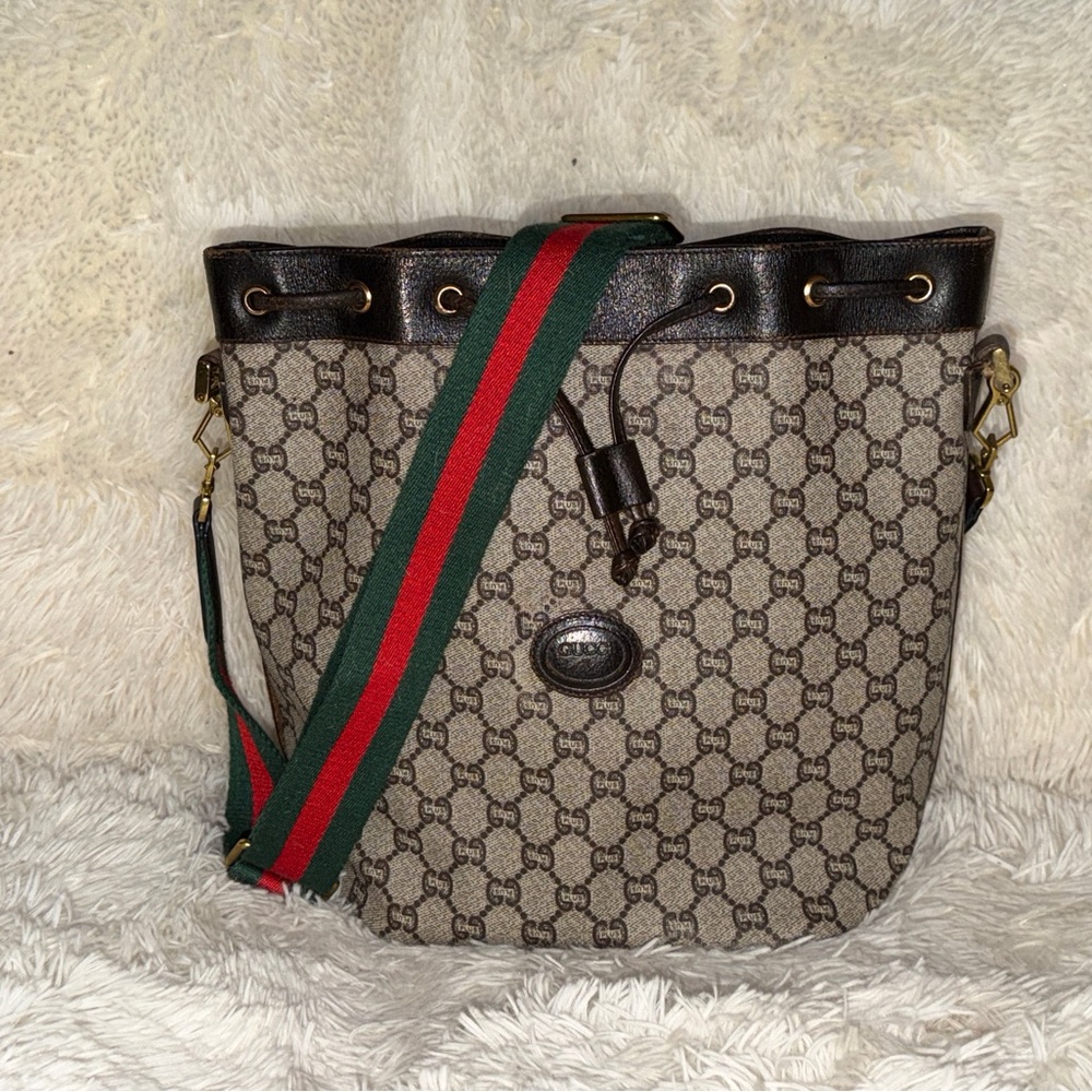 Authentic Gucci Brown Monogram Canvas Drawstring Bucket Bag with Green-Red Strap
